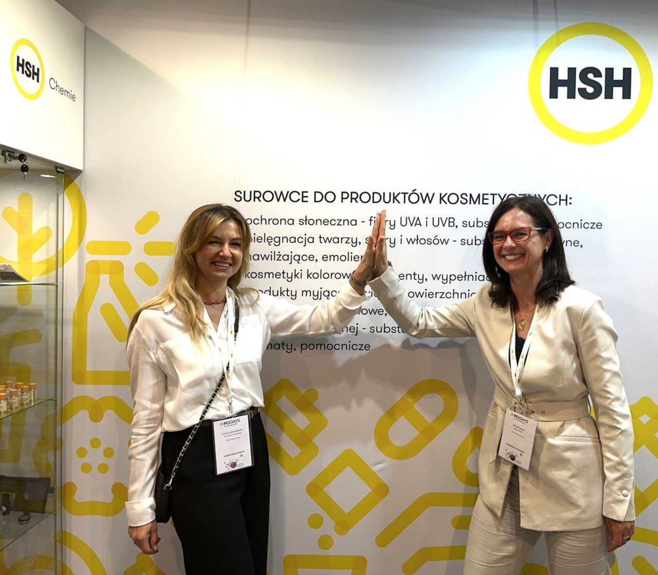 HSH Chemie colleagues give each other a high five at PCI Days 2024.